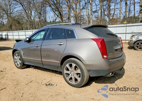2011 Cadillac Srx Performance Collection z USA, uszkodzony, nr VIN 3GYFNEEY2BS672459